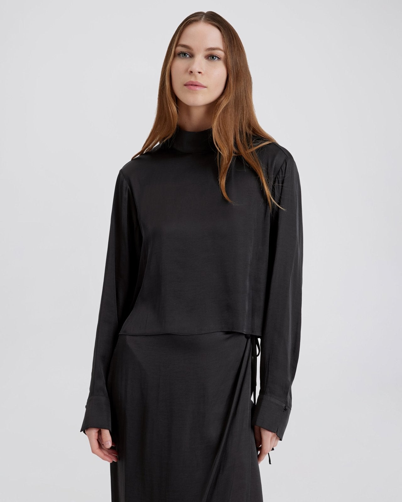 The Leau Top In Noir Solid Striped The leau top in noir solid striped